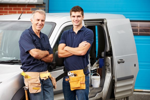 two electrician are standing