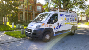 Company van parked in front of home